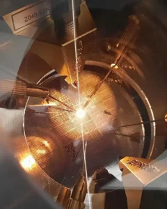 A glowing 4K-MEMS infrared emitter mounted in a laboratory test setup